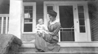 Sandy with his mother, Helen. Alexander "Sandy" Rothney Cross was born in April 11, 1914. (from Glenbow Museum archives)