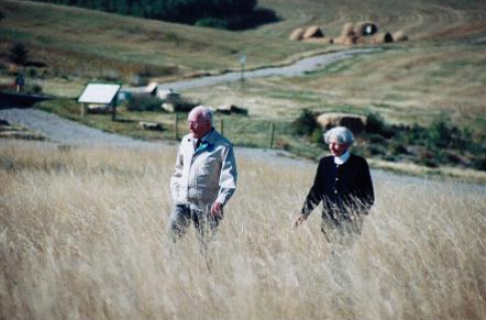 Ann and Sandy walking through Foothills grassland.