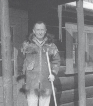 Sandy at his cabin on Rothney Farm, 1957.